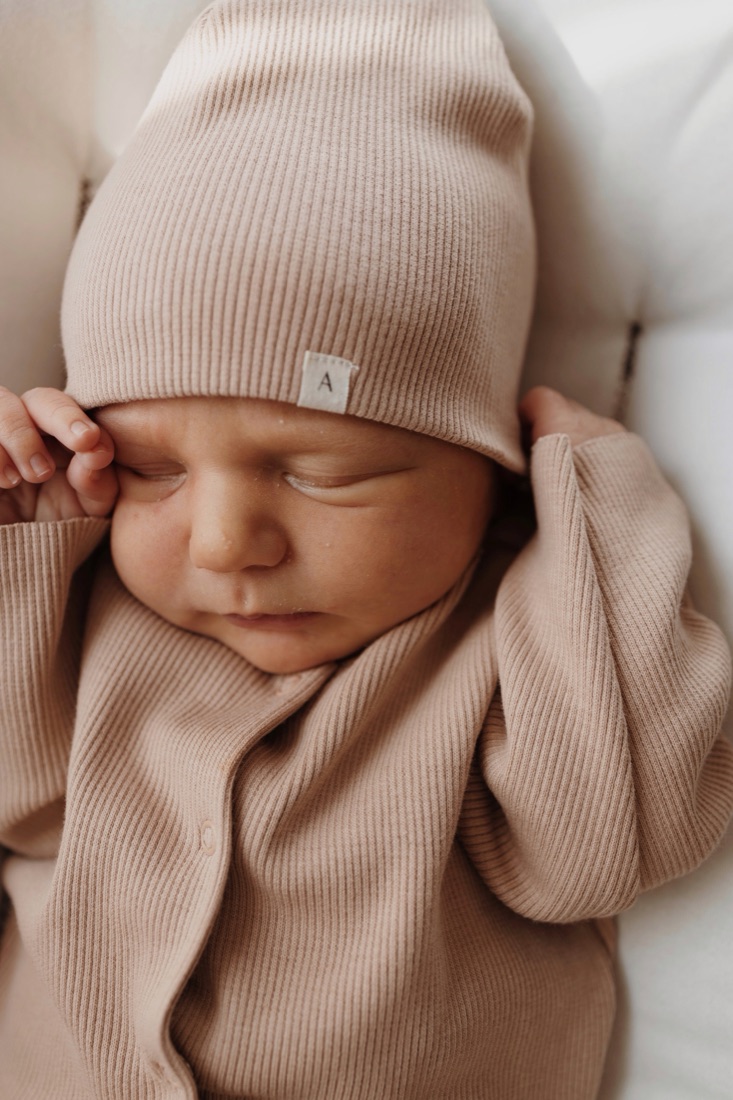 Newborn in an A Basic Brand knit beanie